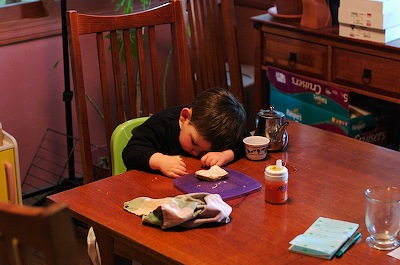 asleep at the table